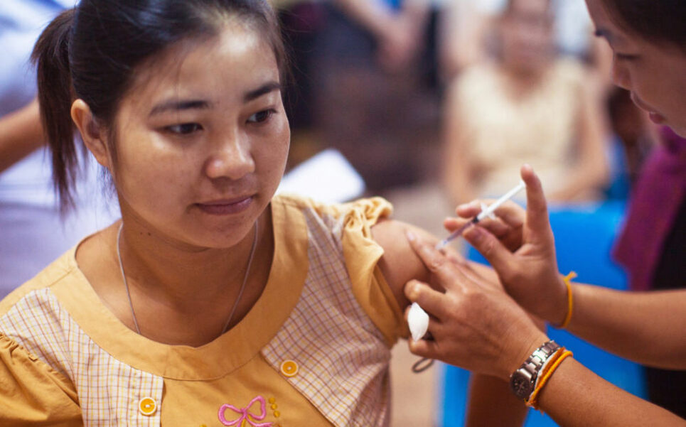Pregnant woman getting a vaccine